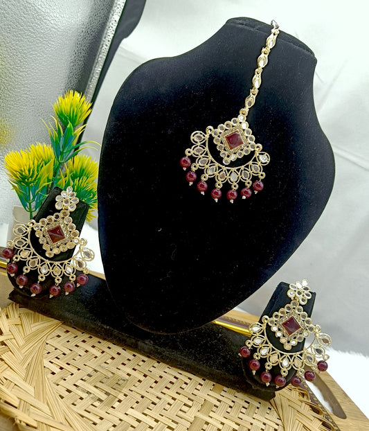 Elegant gold toned kundan chandelier earrings with purple stone center, mirror work detailing, and dangling bead drops, perfect for weddings, festivals, ethnic wear, and traditional Indian occasions celebrations parties gifting