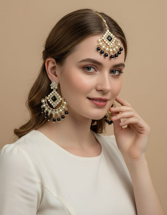 Elegant gold toned kundan chandelier earrings with purple stone center, mirror work detailing, and dangling bead drops, perfect for weddings, festivals, ethnic wear, and traditional Indian occasions celebrations parties gifting