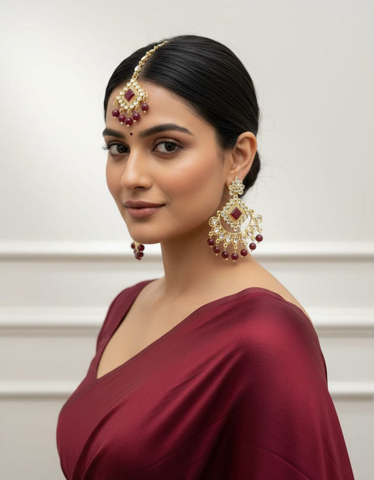 Elegant gold toned kundan chandelier earrings with purple stone center, mirror work detailing, and dangling bead drops, perfect for weddings, festivals, ethnic wear, and traditional Indian occasions celebrations parties gifting